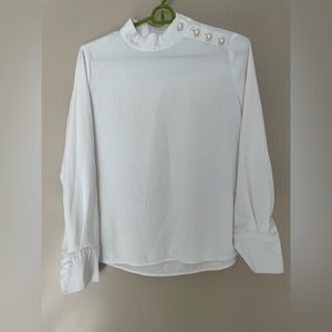 Zara white, mock neck with pearl buttons.